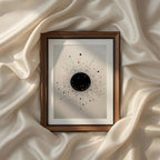 A sophisticated contemporary abstract artwork inspired by celestial energy, cosmic balance, and the elegance of modern geometry. A bold black circular center radiates hundreds of delicate colorful lines and tiny painterly dots that evoke the feeling of an exploding galaxy or solar eclipse. The minimalist composition combines precision with spontaneity, creating a captivating focal point filled with movement and visual harmony. Set against a warm ivory background, the artwork blends modern abstraction with s