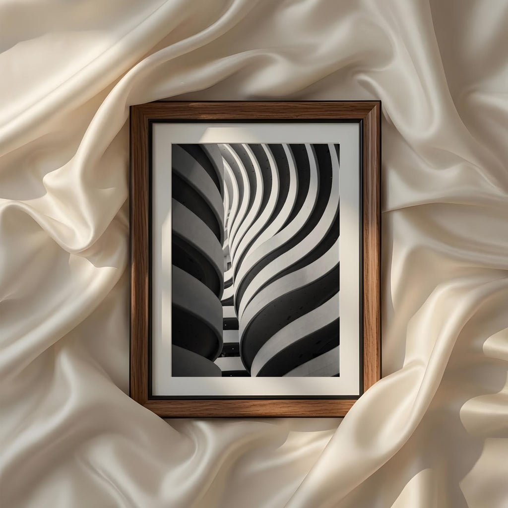 Modern curved architecture captured in elegant black and white fine art photography printable wall art featuring flowing geometric lines for contemporary home decor and gallery walls.