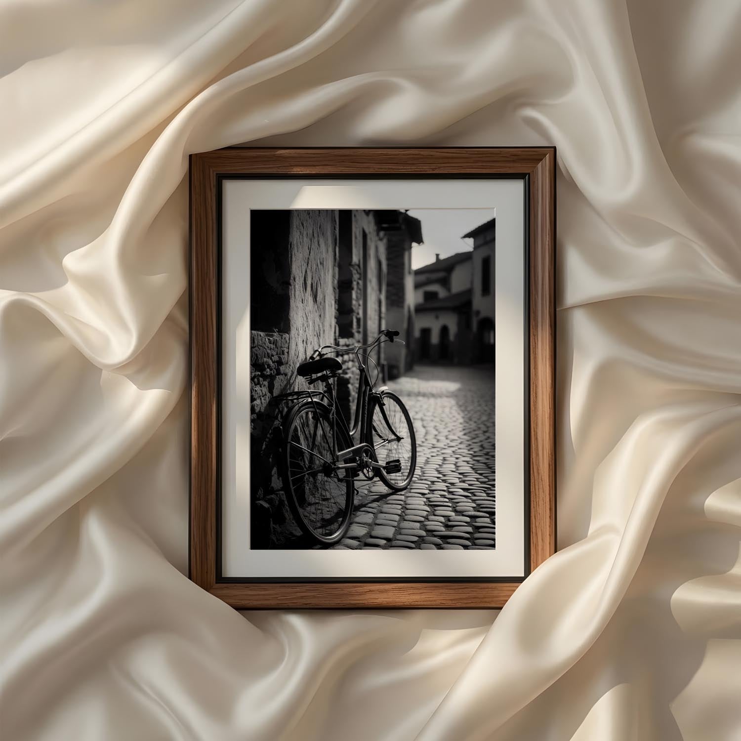 Classic European street photography featuring a vintage bicycle beside cobblestone streets in black and white, printable wall art for modern farmhouse and minimalist homes.