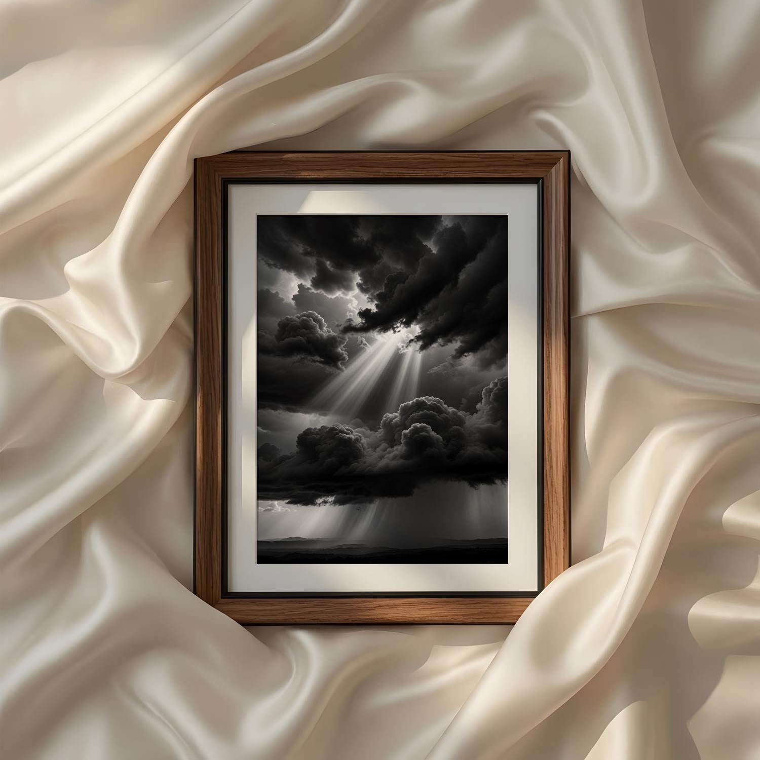 Powerful monochrome landscape photography showcasing dramatic storm clouds and radiant sunbeams, printable black and white wall art for sophisticated modern interiors.