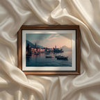 Coastal Mediterranean Photography Set of 9 iArt Tech Studio showcasing a tranquil lakeside harbor with traditional boats, colorful waterfront buildings, calm blue water and a romantic Mediterranean sunset surrounded by dramatic mountain landscapes.