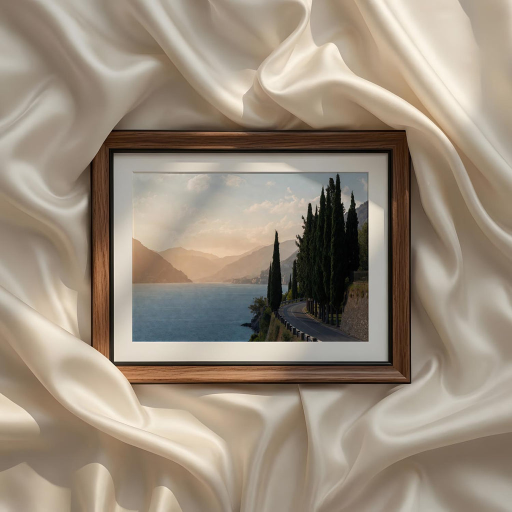 Coastal Mediterranean Photography Set of 9 iArt Tech Studio featuring a scenic lakeside road lined with elegant Italian cypress trees overlooking sparkling Mediterranean waters and sunlit mountain peaks in a classic European landscape.