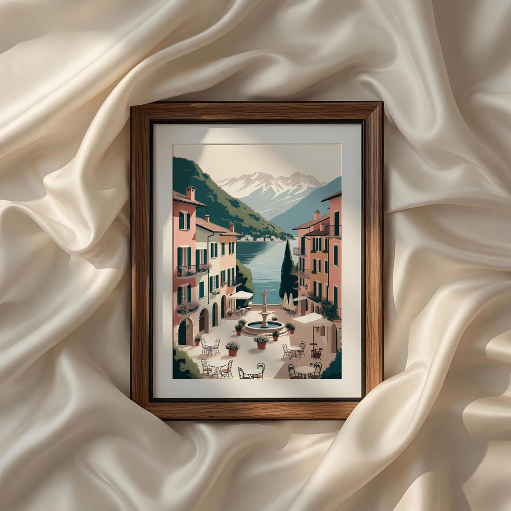 Charming Italian village square overlooking Lake Como with a stone fountain, outdoor café seating, pastel Mediterranean buildings, snow-capped mountains and crystal blue water. Vintage Italian Mediterranean coastal wall art printable, landscape canvas print, poster, digital artwork and elegant home decor.