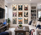 Gallery wall featuring nine Japanese printable wall art prints in light wood frames inside a bright modern American family living room with white walls, cozy sectional sofa, natural daylight, and contemporary home decor.