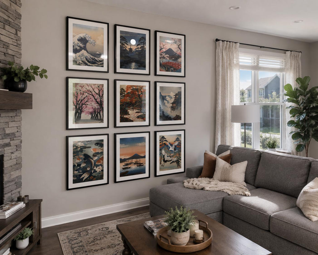 Japanese gallery wall with nine framed printable artworks in black metal frames with white mat and reflective glass, displayed from a diagonal perspective inside a contemporary American family home filled with natural light and elegant neutral decor.