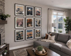 Japanese gallery wall with nine framed printable artworks in black metal frames with white mat and reflective glass, displayed from a diagonal perspective inside a contemporary American family home filled with natural light and elegant neutral decor.