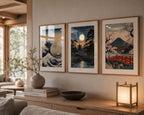 Elegant close-up styling of Vintage Traditional Japanese Vertical Set of 9 iArt Tech Studio featuring three framed vintage Japanese prints displayed above a light wood console table in a luxurious Japandi-inspired American home. Natural oak frames, realistic window reflections, soft golden lighting, handcrafted ceramic décor and minimalist furnishings create premium Japanese wall art inspiration for modern living room, hallway and entryway décor.