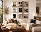 Abstract Beige Black White Neutral Printable Wall Art Kit Set of 9 displayed in a bright modern American open-concept living room with warm wood accents, cream sectional sofa, and elegant kitchen. This Neutral Tones Abstract Gallery Wall Bundle creates a sophisticated minimalist focal point, perfect for contemporary home decor, Scandinavian interiors, printable wall art, modern apartment decorating, and instant digital download artwork.