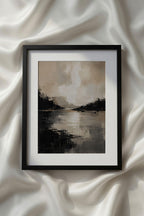 Abstract Beige Black White Neutral Printable Wall Art showcasing a serene lake landscape with calm reflective water, distant shoreline, and layered neutral clouds in beige, ivory, charcoal, and black. This contemporary printable landscape artwork is perfect for modern home decor, neutral living rooms, cozy bedrooms, and Scandinavian gallery walls.
